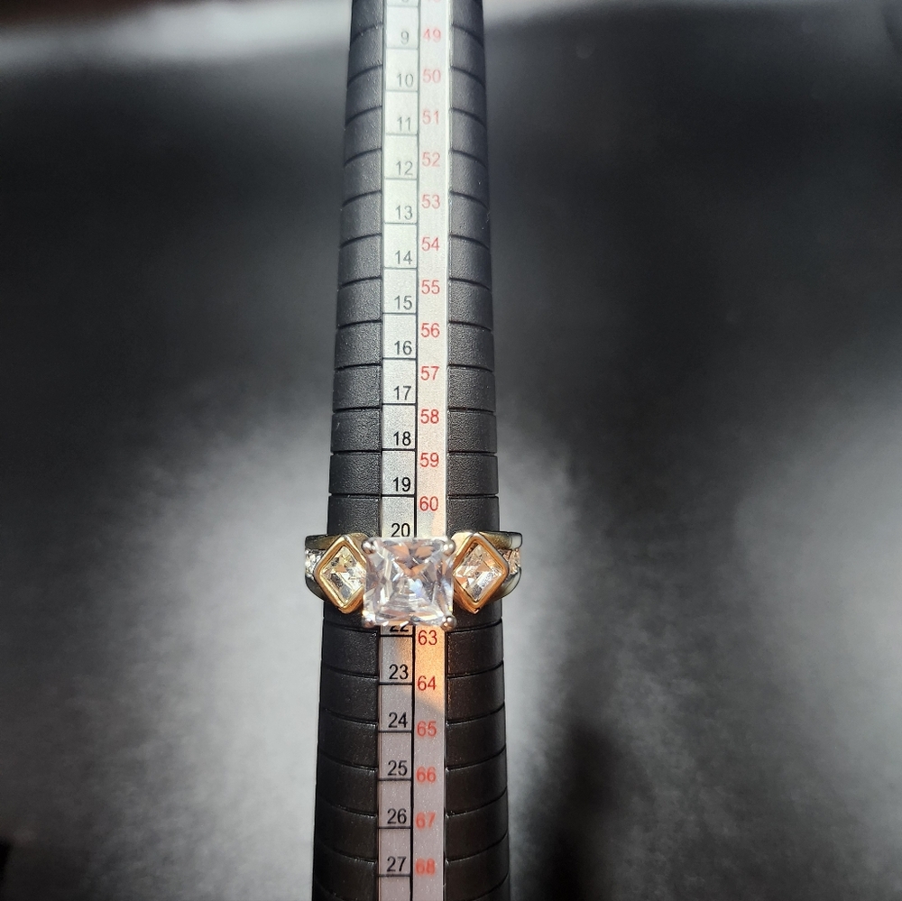 Elegant Gold and Silver Ring with Clear Gemstone